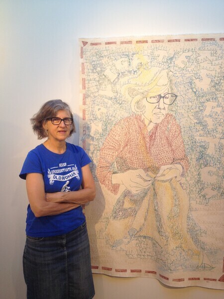 Bettina with her portrait called Navigate Stitch